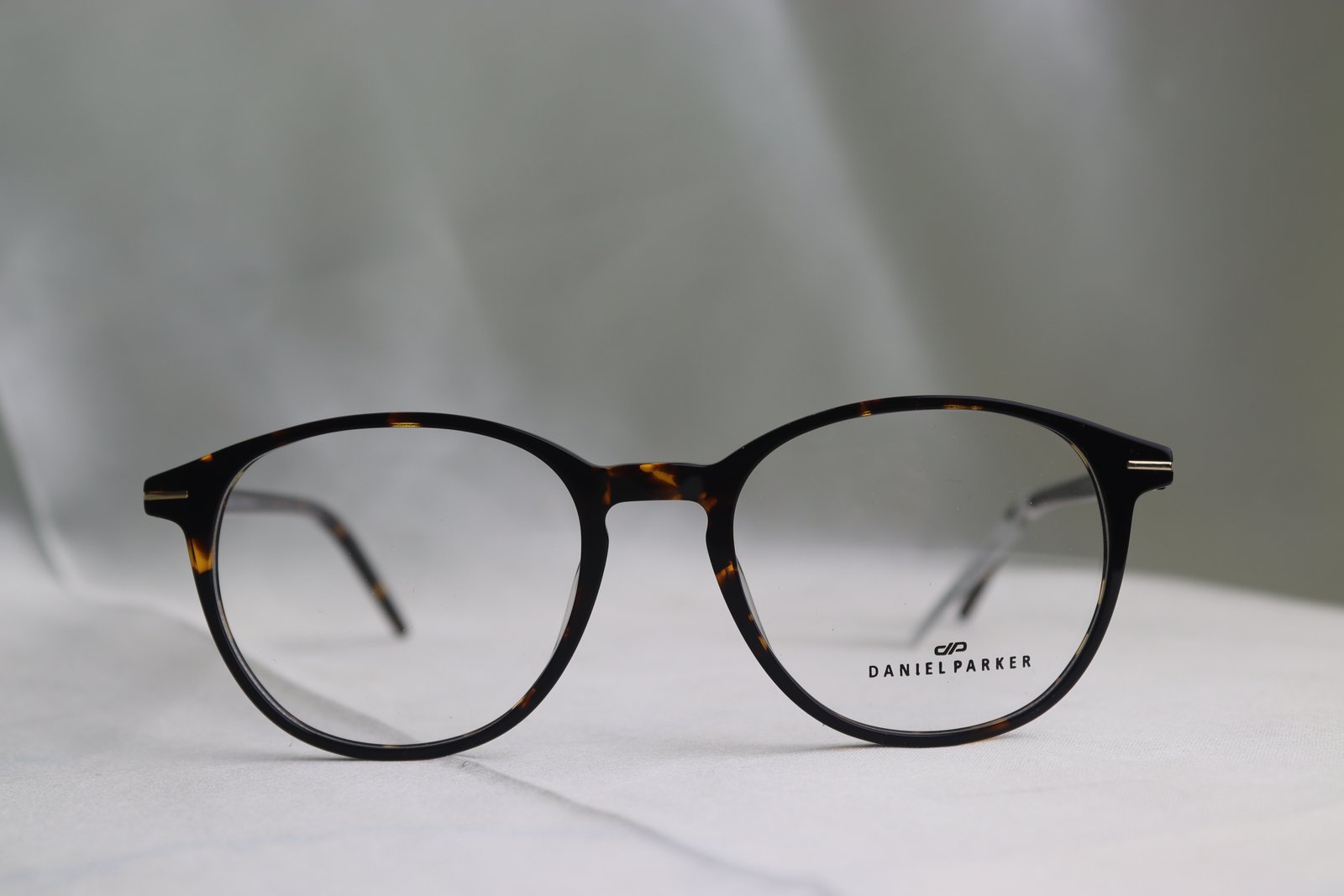 Daniel Parker (Brown round  frame)